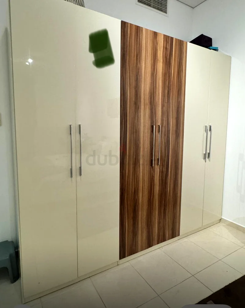 Bedroom set for sale includes wardrobe, bedside tables, dresser and