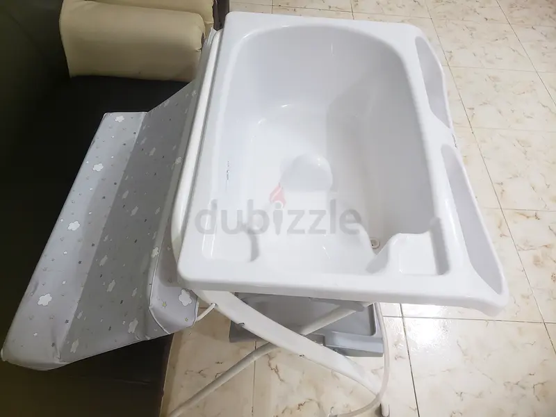 Baby bath tub and changing table