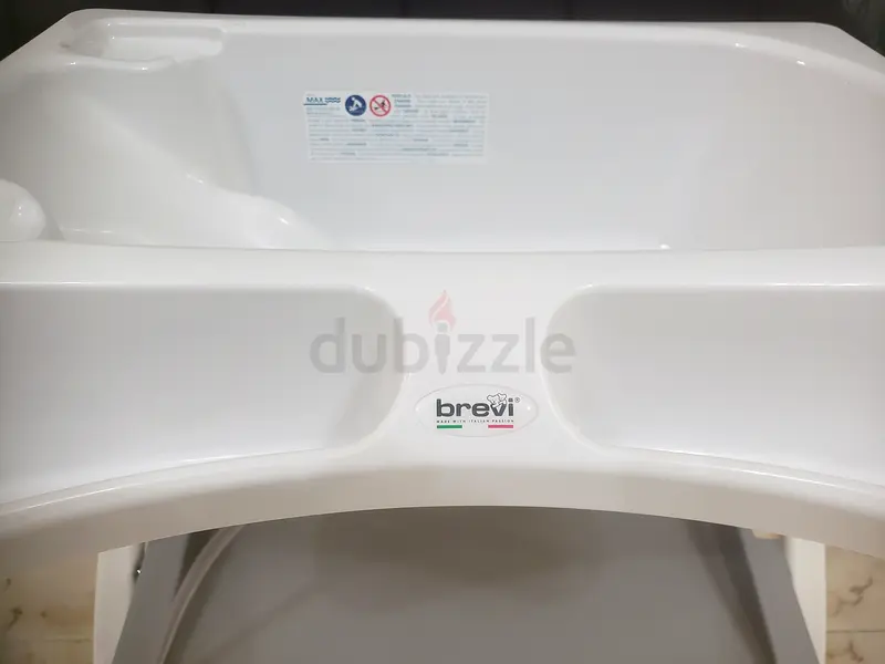 Baby bath tub and changing table