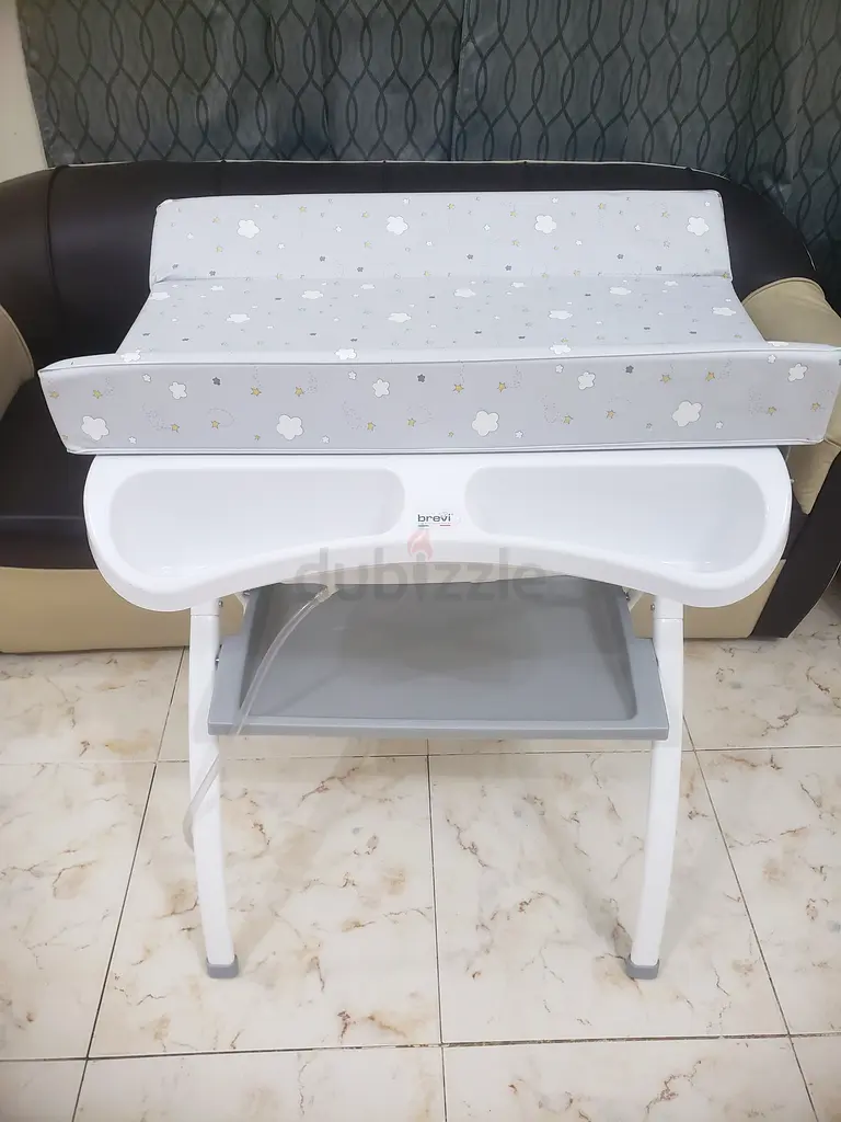 Baby bath tub and changing table