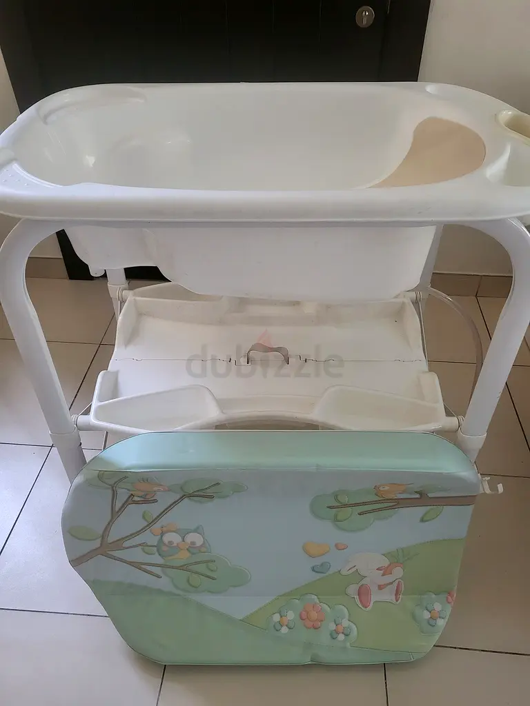 Bath tub with stand and diaper change