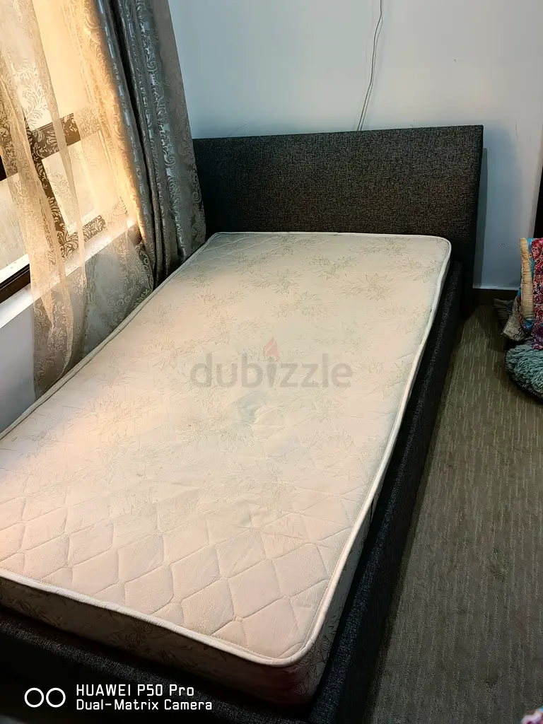 Storage bed with spring mattress