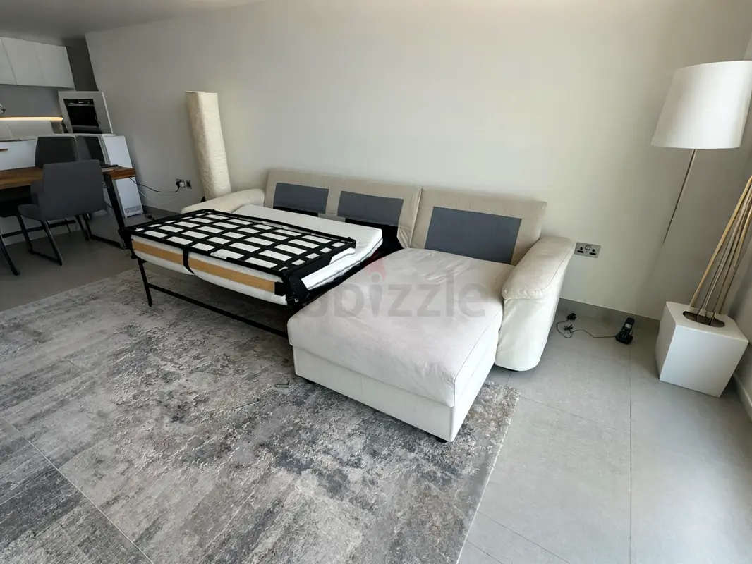 Still new IKEA Lidhult L shape sofa bed beige