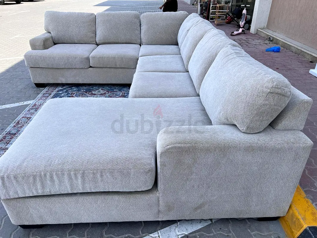Selling brand new Condition united furniture ushape sofa beige
